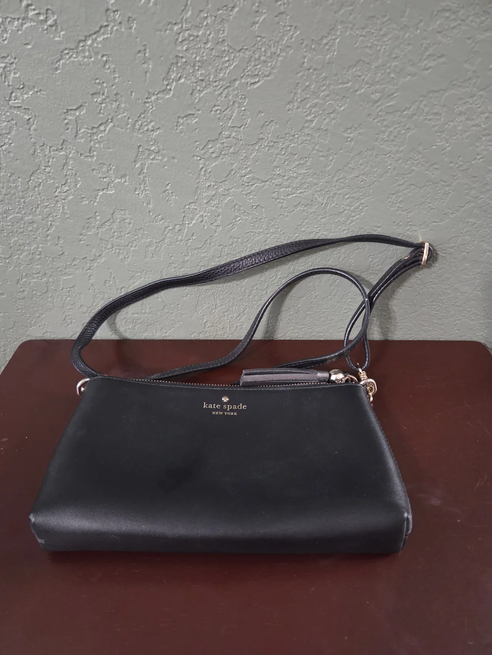 kate spade black leather crossbody with gold hardware